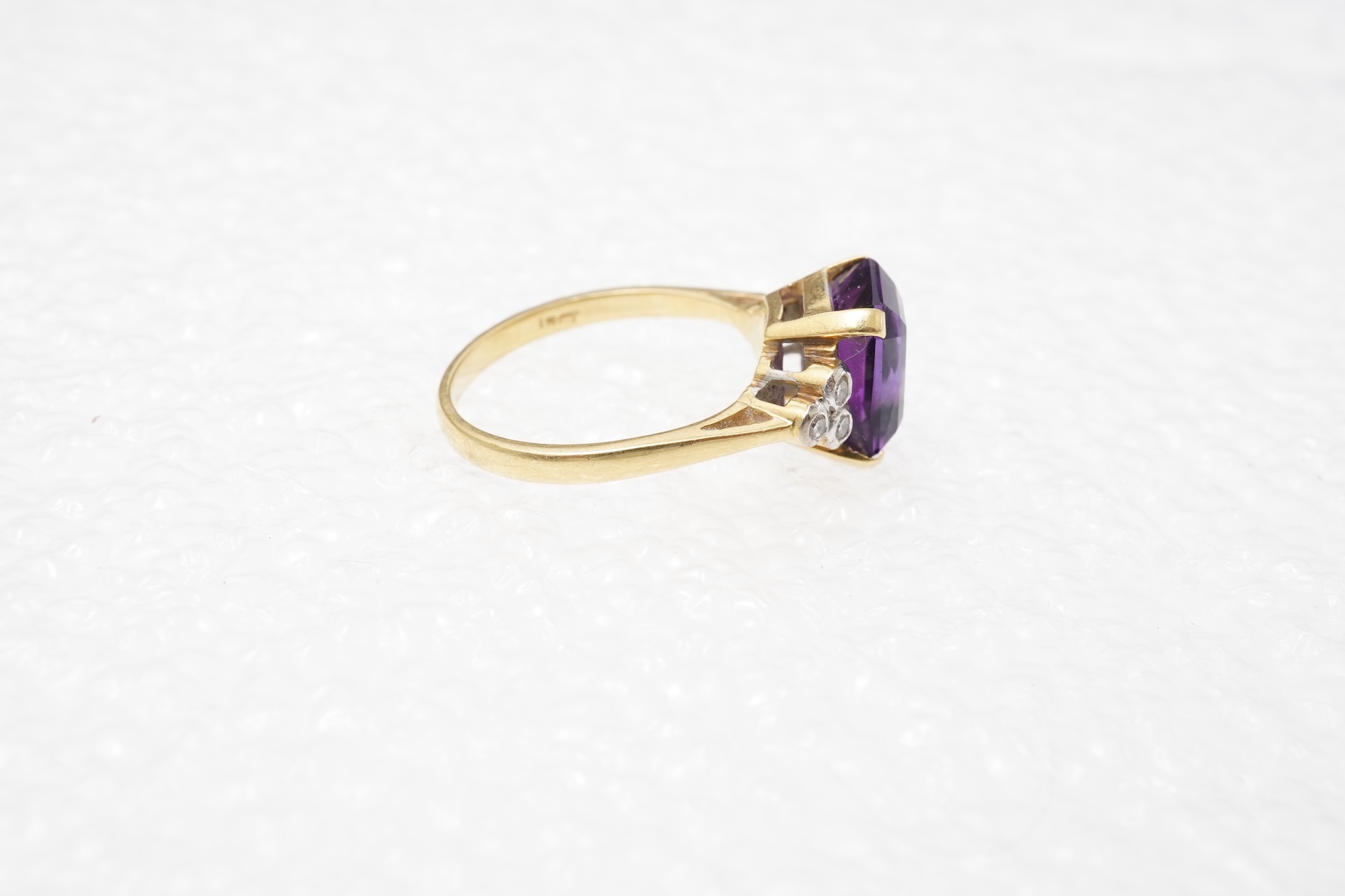 An amethyst and diamond ring